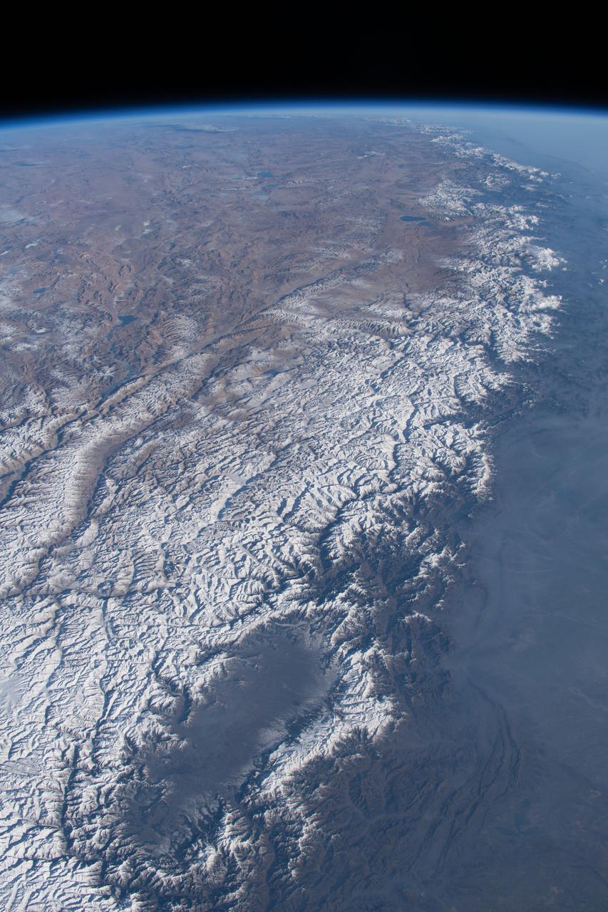 iss070e091714 (Feb. 10, 2024) --- The Kashmir Valley (bottom) and the Himalayas are pictured from the International Space Station as it orbited 261 miles above the Afghanistan-Pakistan border.