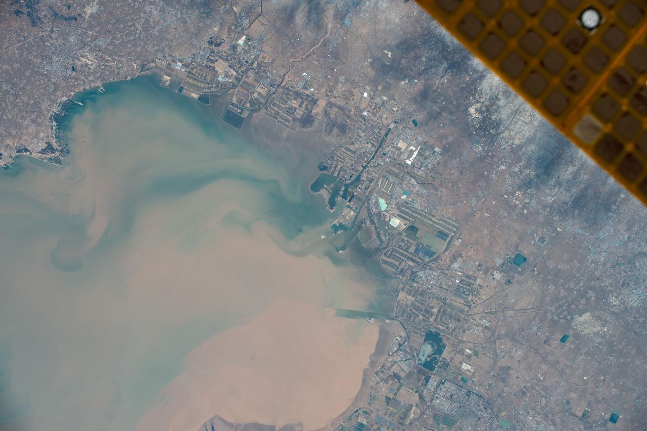iss070e093563 (Feb. 15, 2024) --- Weifang, China, a city with a population of nearly 9.4 million on Laizhou Bay, is pictured from the International Space Station as it orbited 261 miles above.