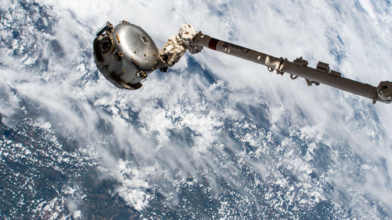 iss070e097971 (Feb. 21, 2024) --- The NanoRacks Bishop airlock is attached to the Canadarm2 robotic arm's latching end effector. Bishop can be uninstalled from its home on the Tranquility module for portable operations. It can also be used to stow cargo and extract or install payloads. The International Space Station was orbiting 261 miles above Brazil near the Bolivian border at the time of this photograph.