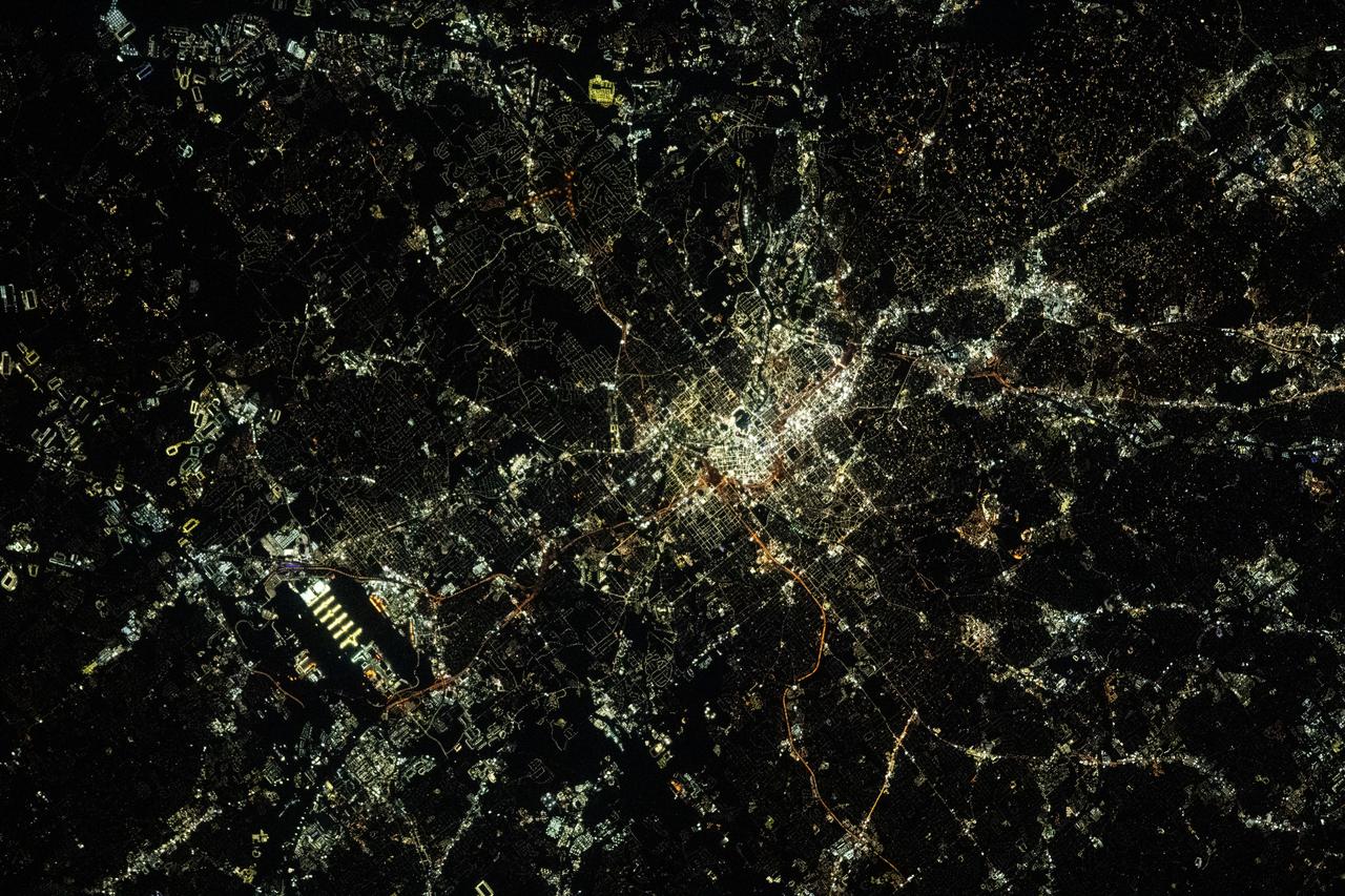 iss070e097979 (Feb. 22, 2024) --- Atlanta, Georgia, and Hartsfield-Jackson Atlanta International Airport (lower left) are pictured during nighttime from the International Space Station as it orbited 260 miles above the Peach State.