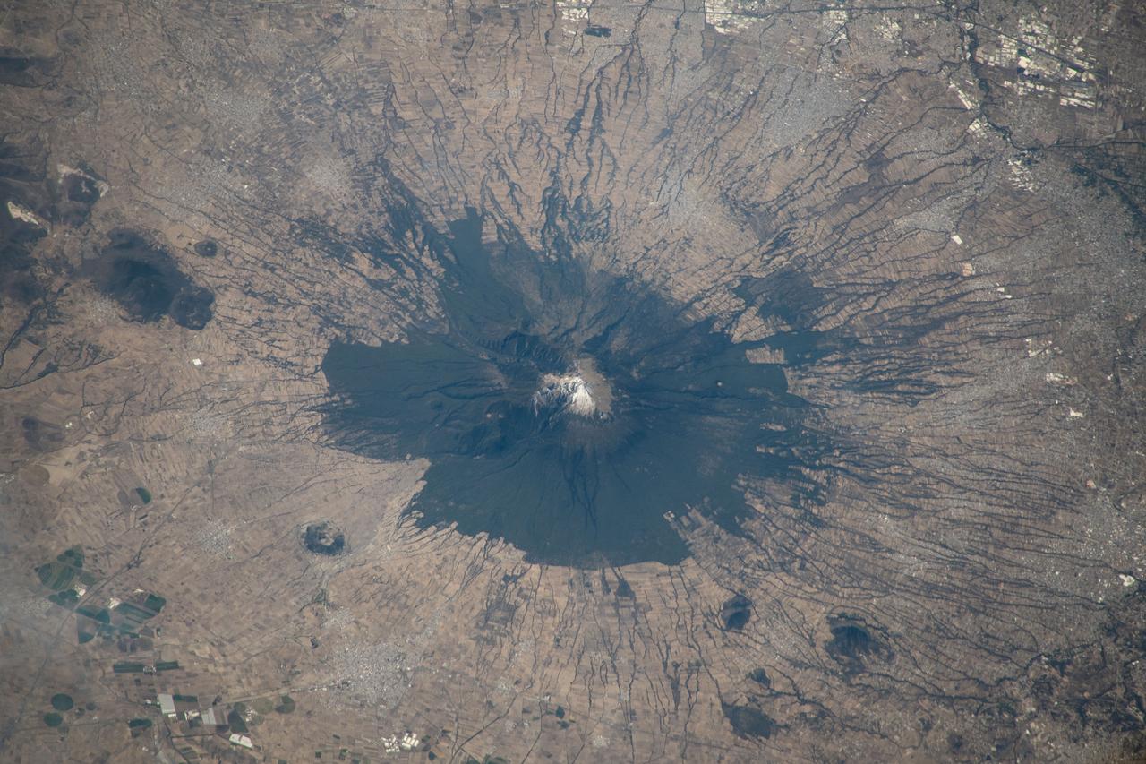 iss070e098294 (Feb. 23, 2023) --- La Malinche, an inactive volcano just west of Mexico City, is pictured from the International Space Station as it orbited off the coast of the Mexican state of Veracruz and 259 miles abovbe the Bay of Campeche.