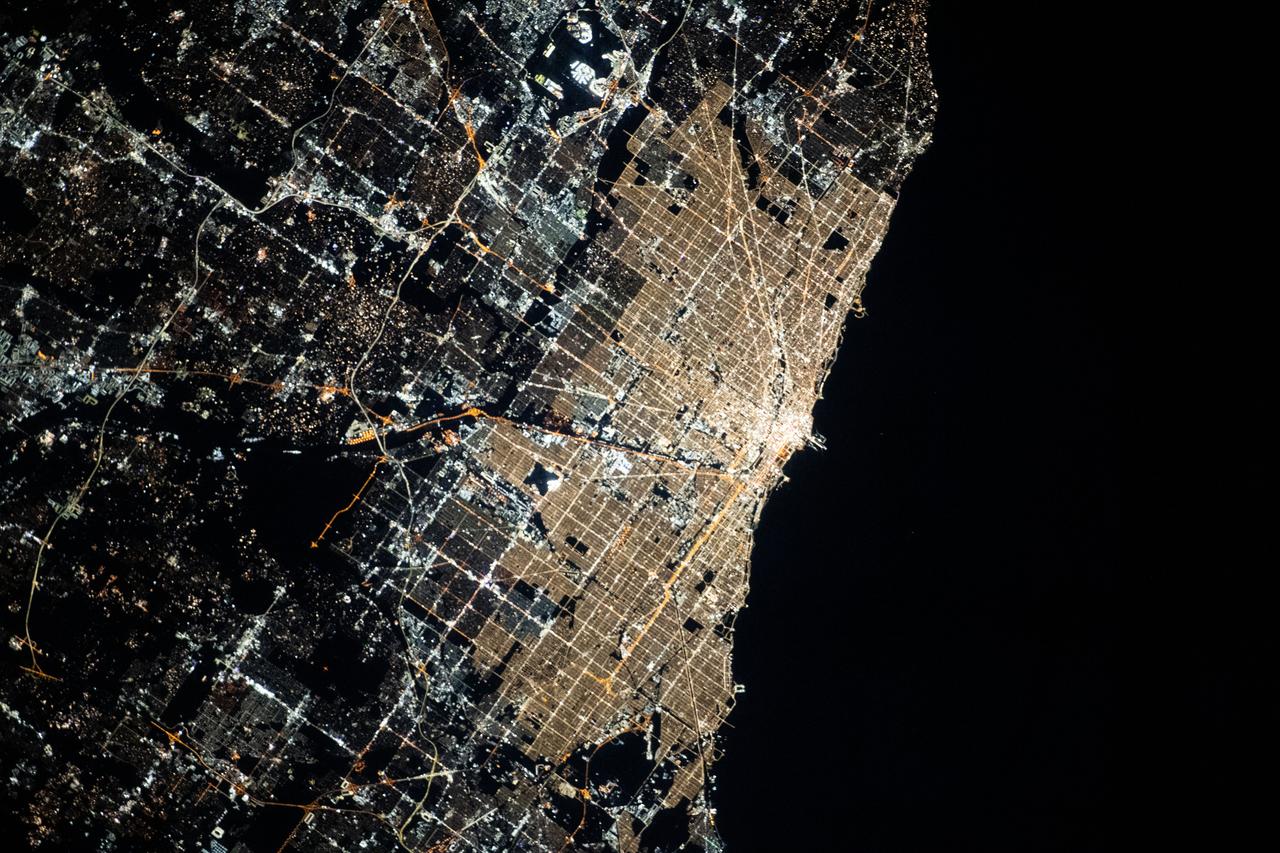 iss070e099645 (Feb., 23, 2024) --- Chicago, Illinois, was pictured at night by Expedition 70 Flight Engineer Jasmin Moghbeli as the International Space Station orbited 261 miles above Lake Michigan.