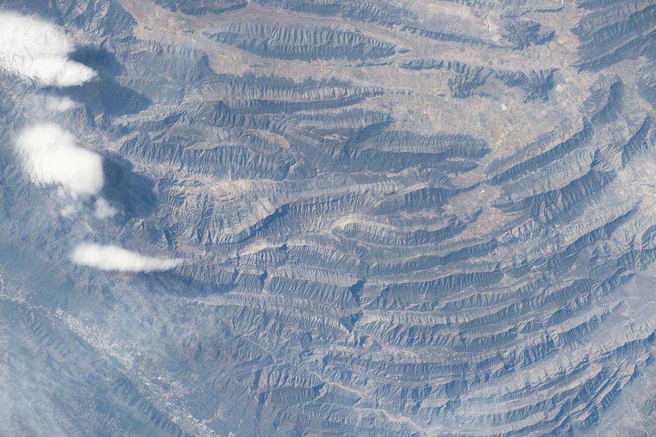 iss070e103269 (Feb. 27, 2024) --- The Summits of Monterrey National Park, part of the Sierra Madre Occidental mountain range and in between the cities of Monterrey and Saltillo in Mexico, was pictured by Expedition 70 Flight Engineer Jasmin Moghbeli of NASA as the International Space Station orbited 263 miles above the Latin American nation.