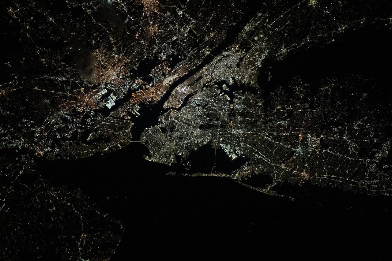 iss070e103432 (Feb. 29, 2024) --- The nightime urban lights of the New York/New Jersey metropolitan area were photographed by Expedition 70 Flight Engineer Jasmin Moghbeli of NASA as the International Space Station orbited 263 miles above the Empire State.