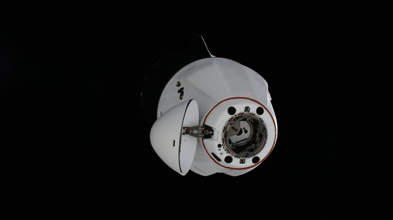 iss070e129463 (March 23, 2024) --- The SpaceX Dragon cargo spacecraft, on NASA's 30th Commercial Resupply Services (CRS-30) mission, approaches the International Space Station for a docking to the Harmony module's space-facing port.