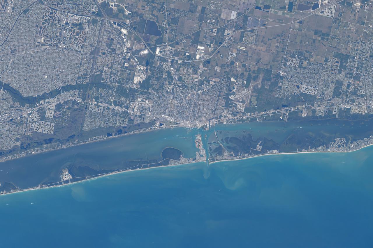 iss071e001300 (April 6, 2024) --- Fort Pierce, Florida, and its surrounding suburbs are pictured from the International Space Station as it orbited 258 miles above The Sunshine State's Atlantic coast.