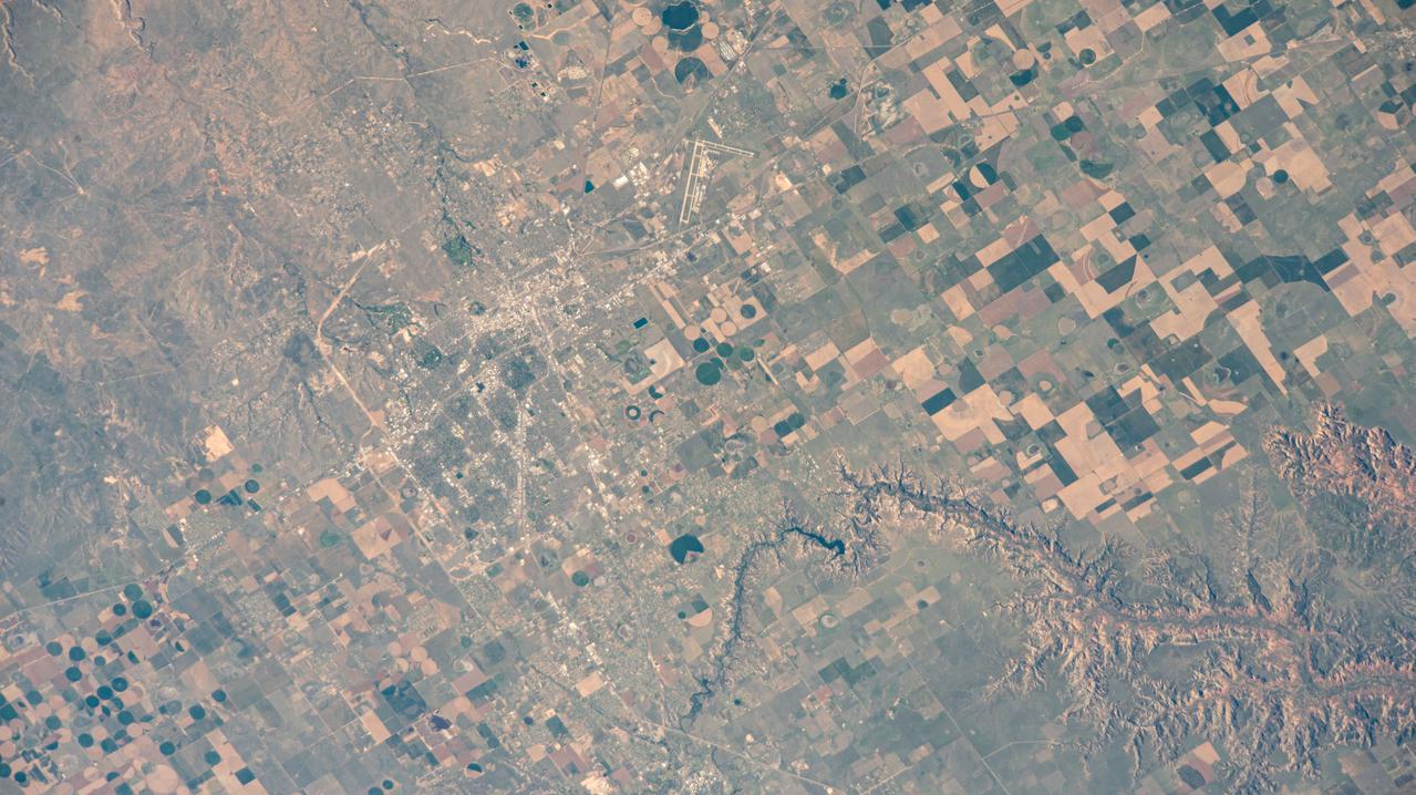 iss071e046217 (April 30, 2024) --- Amarillo, Texas, near Palo Duro Canyon State Park (bottom right), is home to Rick Husband Amarillo International Airport (center top), named after the former NASA astronaut. The International Space Station was orbiting 258 miles above the Lone Star State's Panhandle as the time of this photgraph.
