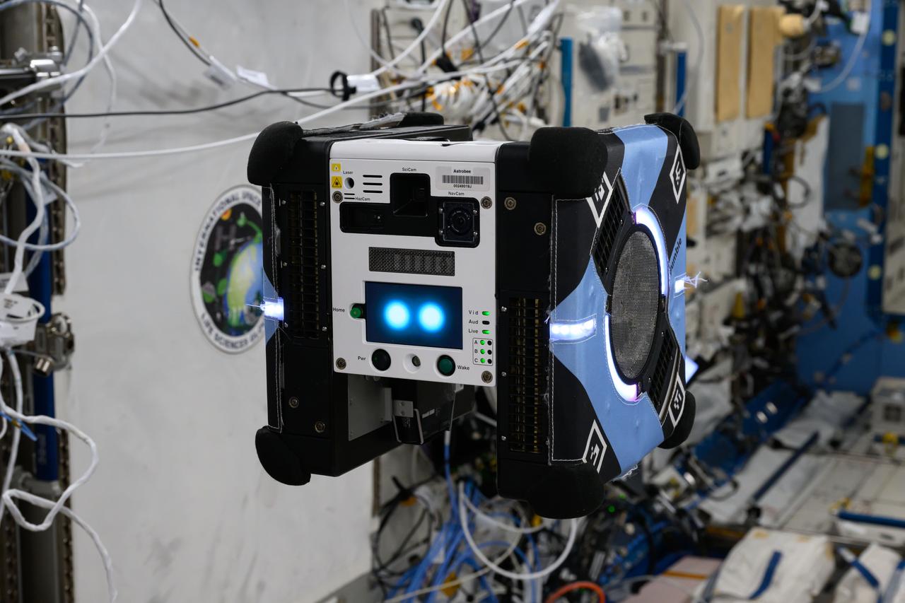   iss071e046284 (May 1, 2024) -- One of the International Space Station's free-flying robots, Astrobee, was pictured by NASA astronaut and Expedition 71 Flight Engineer Tracy C. Dyson during a Zero Robotics tech demonstration. Zero Robotics allows students on Earth to write software to control the robots and observe their performance inside the orbiting laboratory.
