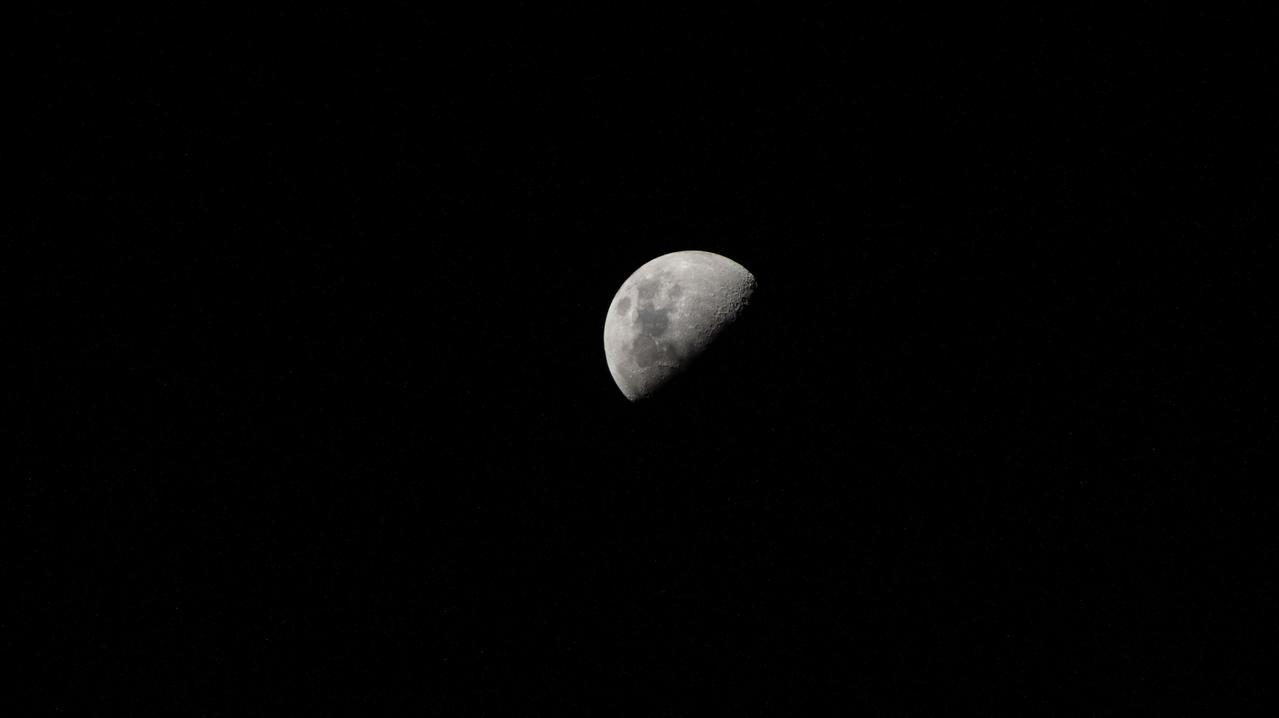 iss071e081873 (May 16, 2024) --- The First Quarter Moon is pictured from the International Space Station as it orbited 255 miles above the Pacific Ocean.