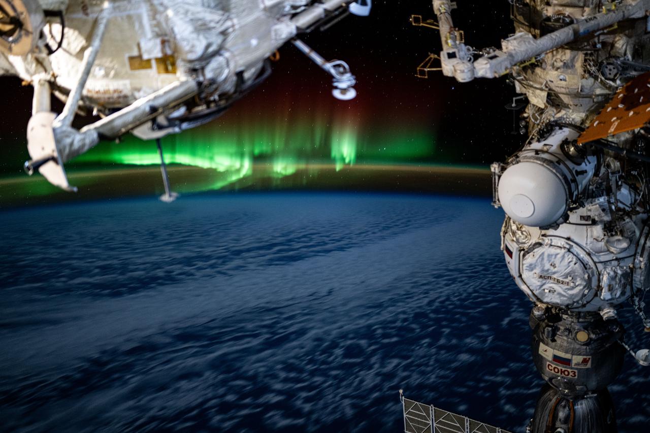 iss071e142810 (May 29, 2024) --- An aurora swirls above the Indian Ocean in this photograph from the International Space Station as it orbited 266 miles above and due south of Australia's island state of Tasmania.