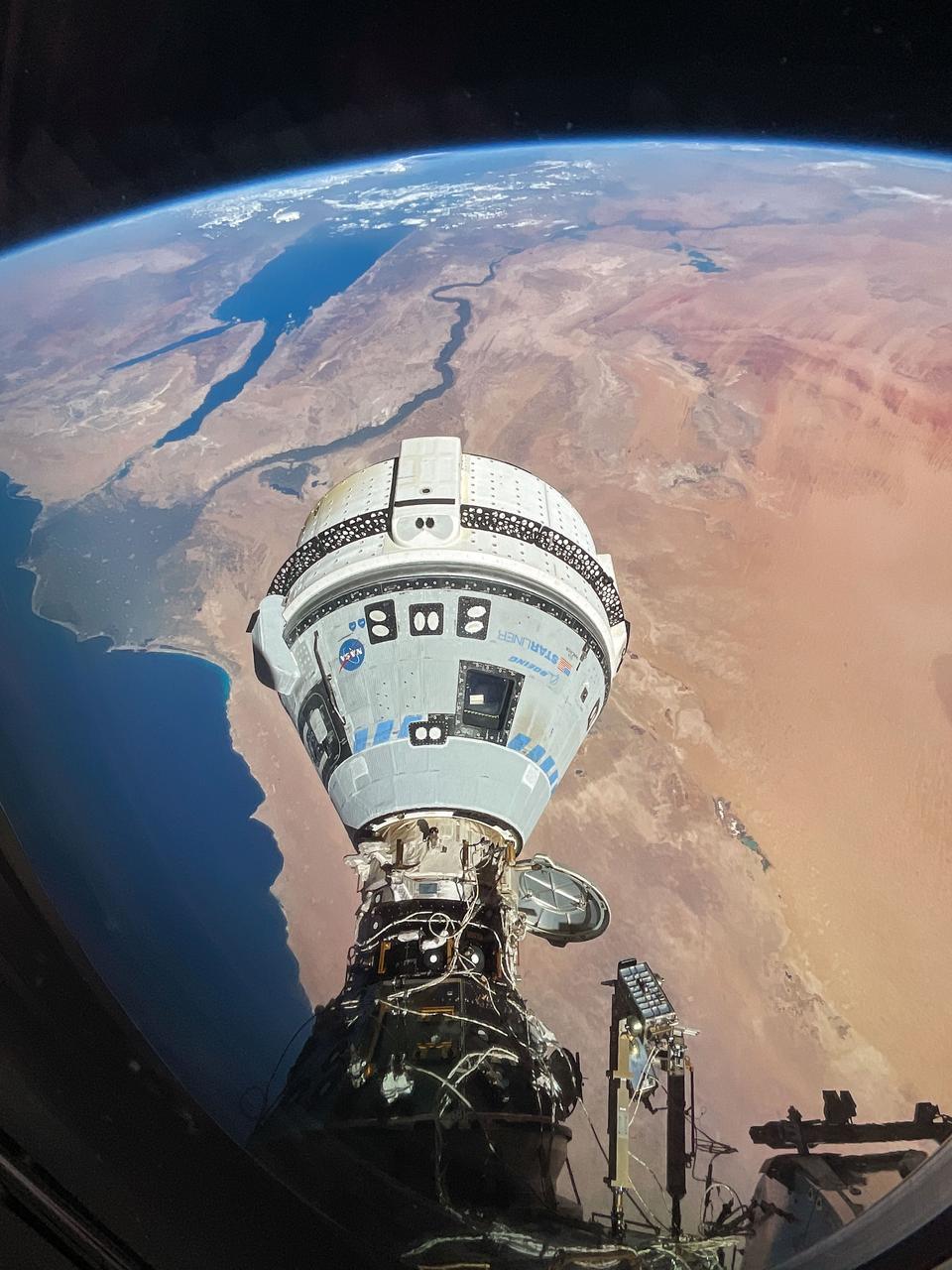 iss071e182991 (June 13, 2024) --- The Starliner spacecraft on NASA's Boeing Crew Flight Test is pictured docked to the Harmony module's forward port as the International Space Station orbited 262 miles above Egypt's Mediterranean coast.
