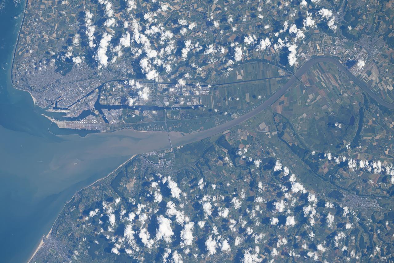 iss071e207619 (June 23, 2024) --- The French port city of Le Havre on the river Seine at the mouth of the English Channel is pictured from the International Space Station as it orbited 264 miles above. The cable-stayed bridge Pont de Normandie crosses the Seine and links Le Havre to the city of Honfleur in France's Normandy region.