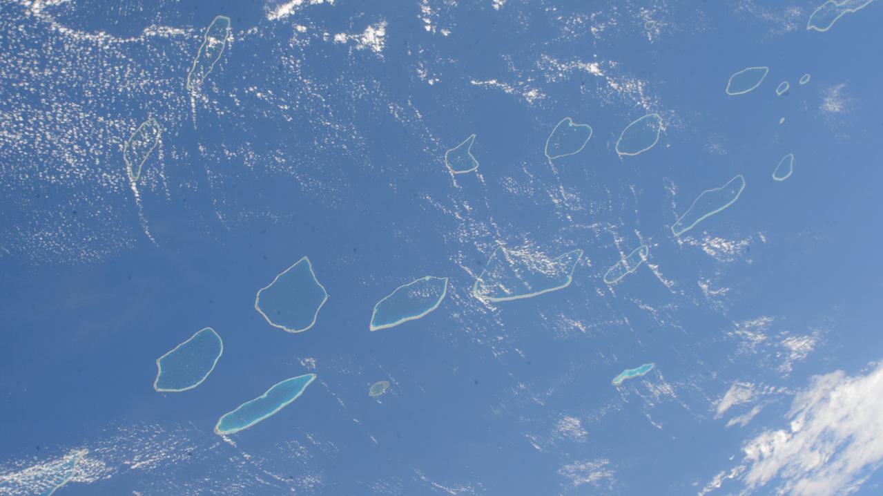 iss071e207656 (June 22, 2024) --- The Palliser Islands, atolls that are part of Fench Polynesia's Tuamotu Archipelago in the Pacific Ocean, are pictured from the International Space Station as it orbited 266 miles above.