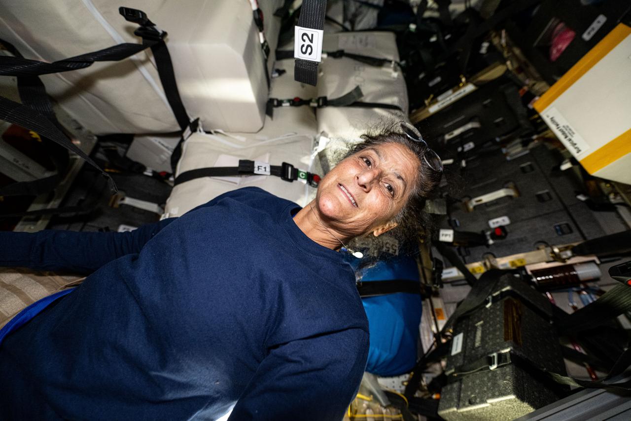 iss071e245418 (July 1, 2024) --- NASA astronaut and Boeing Starliner Pilot Suni Williams is pictured inside the Northrop Grumman Cygnus space freighter during cargo operations.