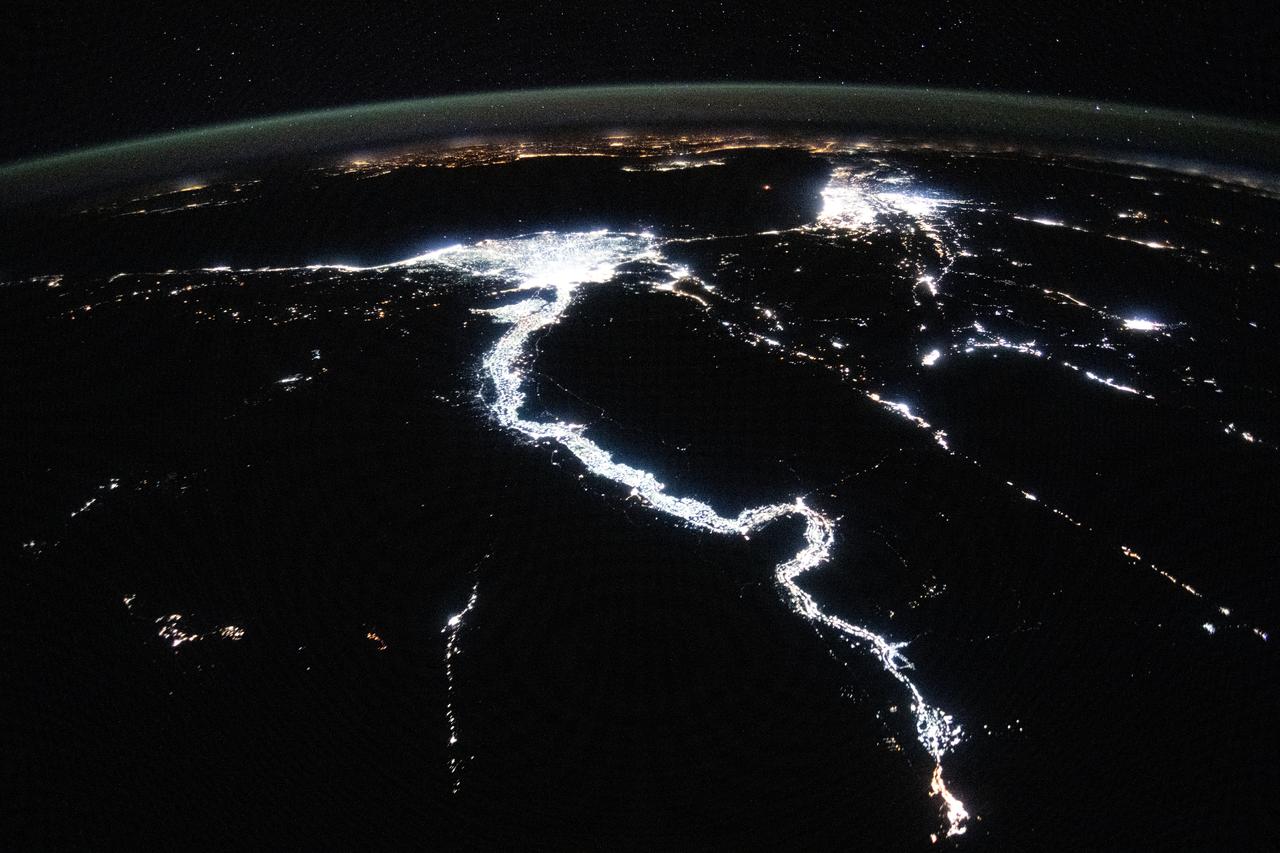 iss071e256968 (June 30, 2024) --- The night lights of civilization highlight the Nile River and dimly outline the shores of the Red Sea, the Gulf of Suez, and the Gulf of Adaba in the Middle East. The nations of Israel, Jordan, and Syria, as well as the Southern European region across the darkness of the Mediterranean Sea also are well lit in this photograph taken from the International Space Station at approximately midnight local time in Cairo, Egypt.