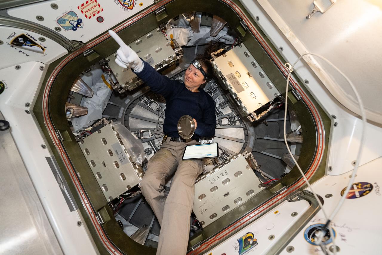 iss071e321386 (July 11, 2024) --- NASA astronaut and Expedition 71 Flight Engineer Tracy C. Dyson is pictured inside the vestibule between the Unity module and Northrop Grumman's Cygnus space freighter. She had just closed Cygnus' hatch in preparation for its depressurization and departure from the International Space Station.