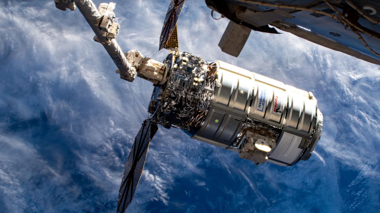 iss071e329982 (July 12, 2024) --- Northrop Grumman's Cygnus space freighter is attached to the leading end effector of the 57.7-foot-long Canadarm2 robotic arm about to be released into Earth orbit ending a five-and-a-half month cargo mission berthed to the International Space Station's Unity module.