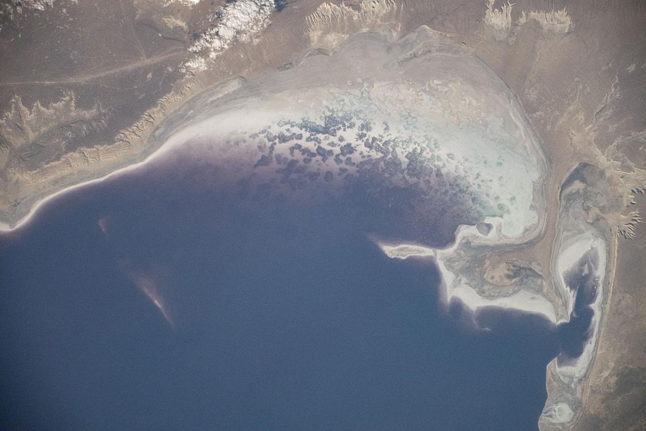 iss071e364940 (July 19, 2024) -- Off the eastern coast of the Caspian Sea is the Garabogazköl Basin, a high saline lagoon in Turkmenistan, pictured here from the International Space Station as it orbited 257 miles above.