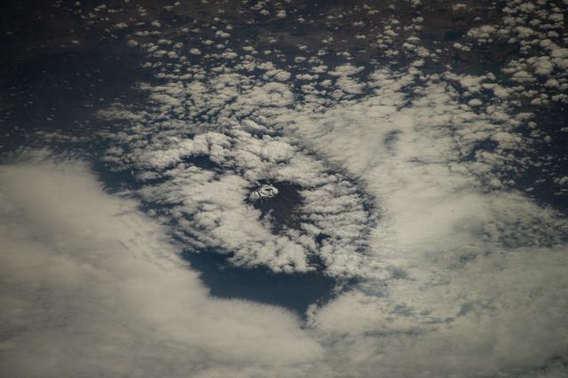 NASA image: Mount Kilimanjaro surrounded by clouds and the highest mountian in Africa