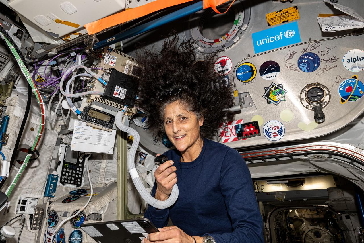 NASA astronaut and Boeing Crew Flight Test Pilot Suni Williams Suni Williams uses a HAM radio and talks to students from Banda Aceh, Indonesia, answering their questions about life in space and other space related subjects aboard the International Space Station.