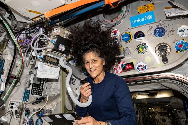 NASA image: Astronaut Suni Williams uses a HAM radio and talks to students