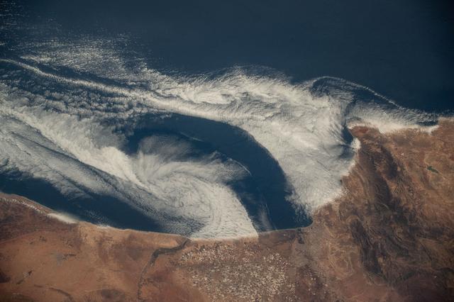 NASA image: Clouds move in over the coast of Morocco