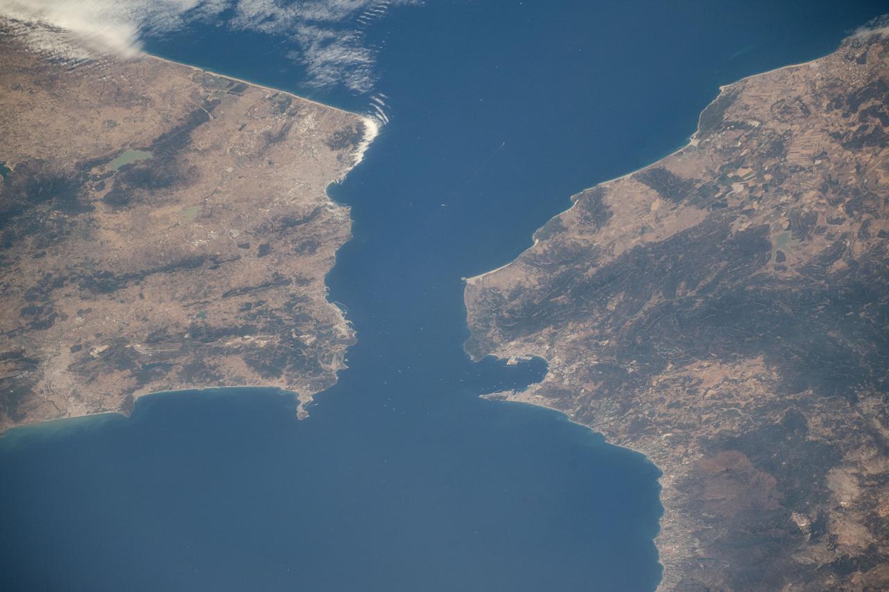 iss071e414110 (July 30, 2024) -- The Strait of Gibraltar separates Morocco (left) and Spain (right) while connecting the Atlantic Ocean to the Mediterranean Sea. The narrow strait spans only ~8 miles (~13 kilometers) between the two countries. As the International Space Station soared 258 miles above, NASA astronaut Matthew Dominick captured this photo.