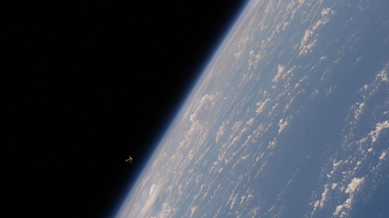 iss071e489468 (Aug. 17, 2024) --- The Progress 89 cargo craft approaches the International Space Station above Earth's horizon in this photograph from the orbital outpost as it soared 257 miles above the Philippine Sea.