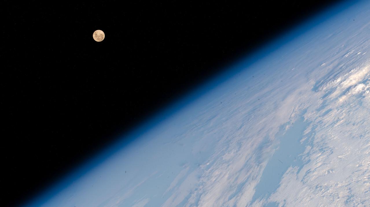 iss071e515452 (Aug. 19, 2024) --- The Full Moon pictured above Earth's horizon as the International Space Station soared 262 miles above the Indian Ocean south of the African island nation of Madagascar.