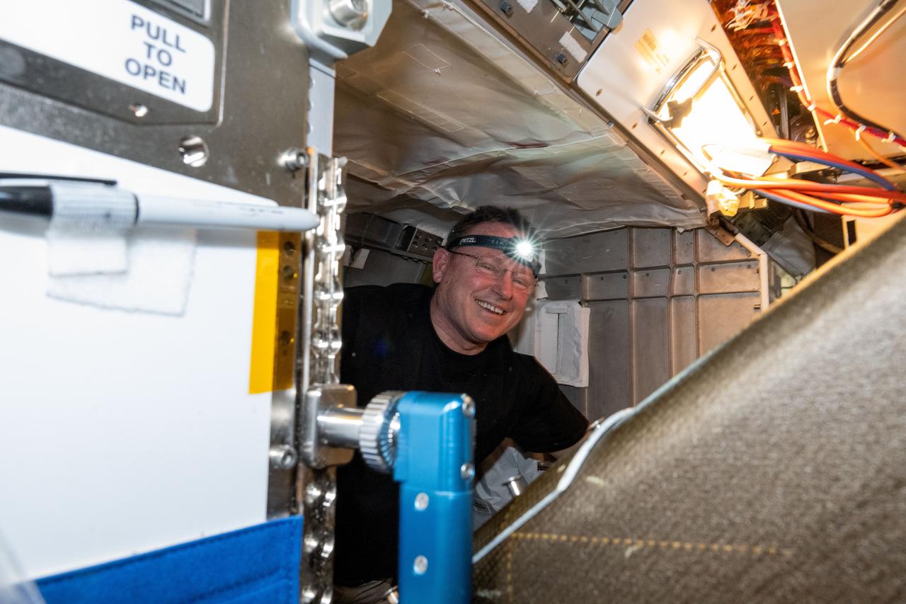 iss071e580589 (Aug. 27, 2024) --- Veteran NASA astronaut Butch Wilmore, who has launched to the International Space Station on three different spacecraft (Space Shuttle Atlantis, Soyuz TMA-14, and Boeing's CST-100 Starliner), services life support hardware located in the Tranquility module’s Air Revitalization System rack.