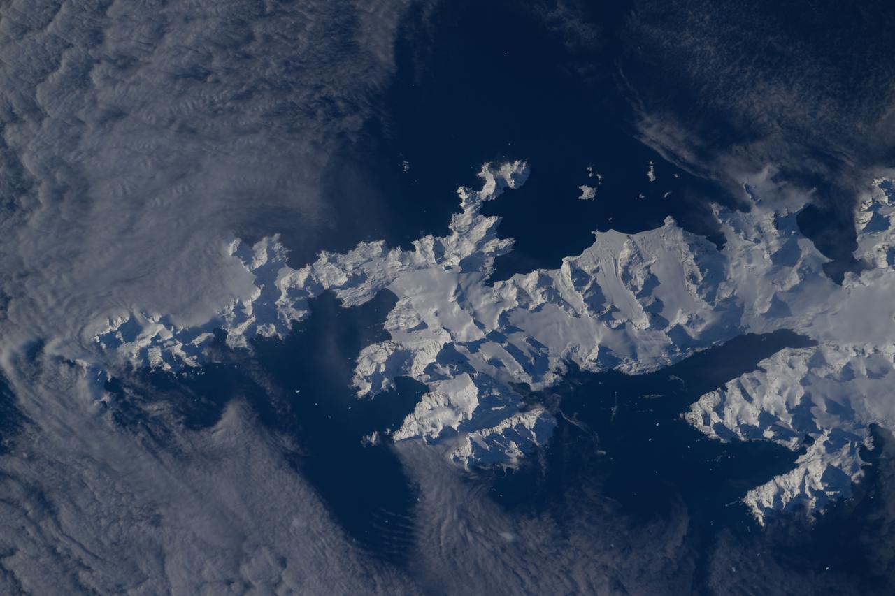 iss071e581850 (Sept. 1, 2024) -- In the southern Atlantic ocean is a snow-covered South Georgia Island. The British Overseas Territory was photographed by NASA astronaut Michael Barratt as the International Space Station orbited 267 miles above.