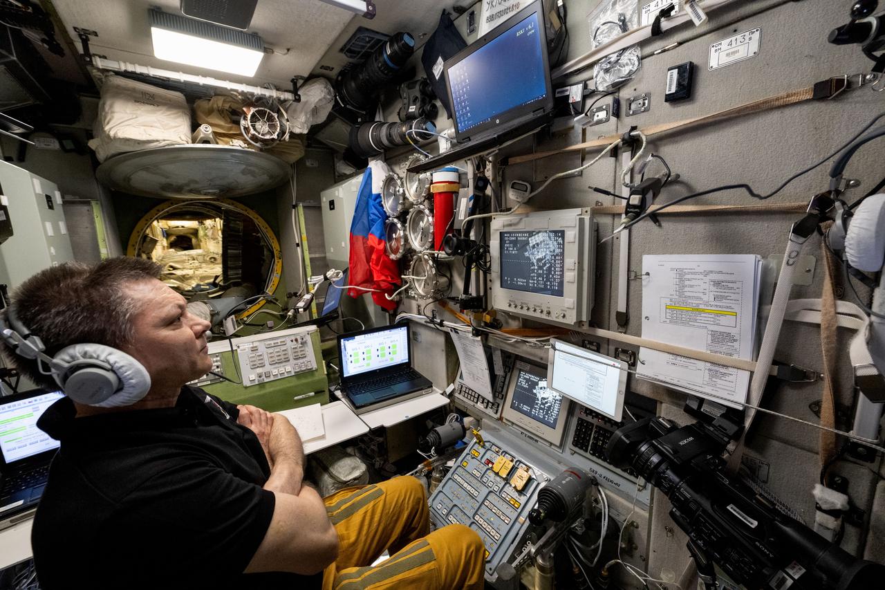 iss071e608454 (Aug. 17, 2024) --- Roscosmos cosmonaut and Expedition 71 Commander Oleg Kononenko is at the controls of the telerobotically operated rendezvous unit, or TORU, monitoring the automated rendezvous and docking of the Progress 89 cargo craft. Located inside the International Space Station's Zvezda service module, the TORU can be used to remotely control the Roscosmos spaceship in the unlikely event it would be unable to complete its automated docking.