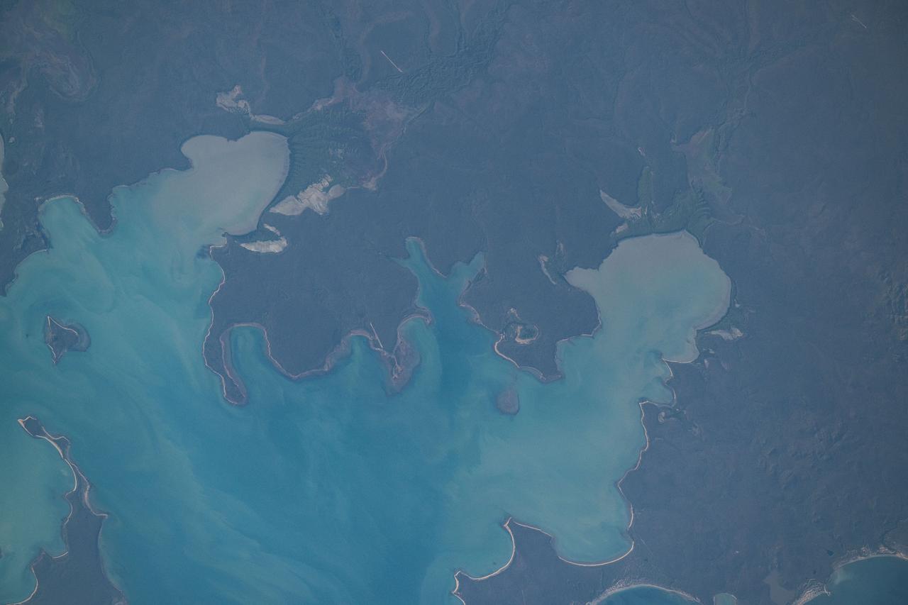 iss071e615395 (Sept. 9, 2024) -- As the International Space Station orbited 260 miles above the Northern Territory of Australia, NASA astronaut Mike Barratt captured this photograph of Blue Mud Bay.