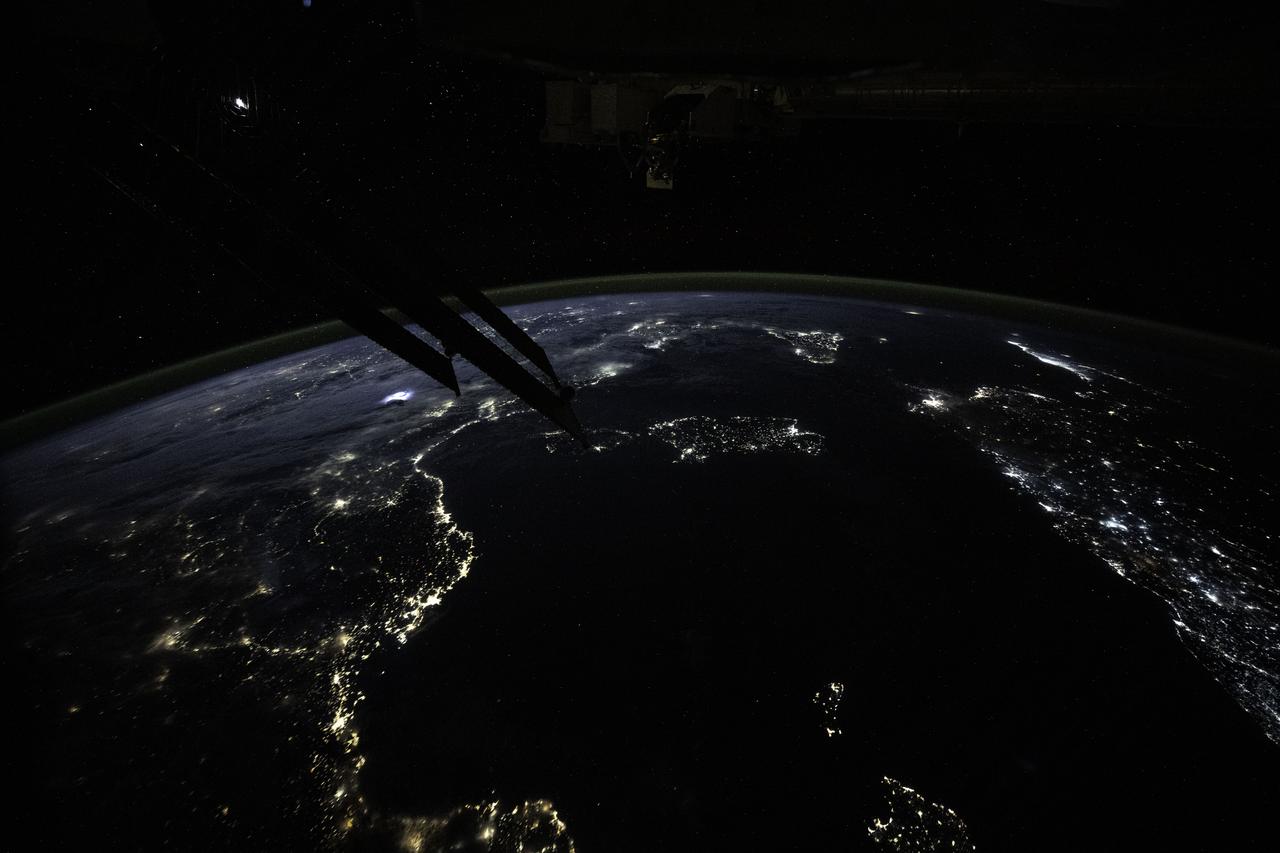 iss072e000922 (Sept. 23, 2024) -- The vibrant night lights of coastal cities on the Mediterranean Sea, from Spain to Italy in Europe and Algeria to Lybia in Africa, are pictured from the International Space Station as it orbited 262 miles above Barcelona. Peeking in at the bottom of the image is Mallorca Island, next to it Minorca. The Italian islands of Corsica, Sardinia, and Sicily are also visible. Above Earth, stars glitter in the night sky.
