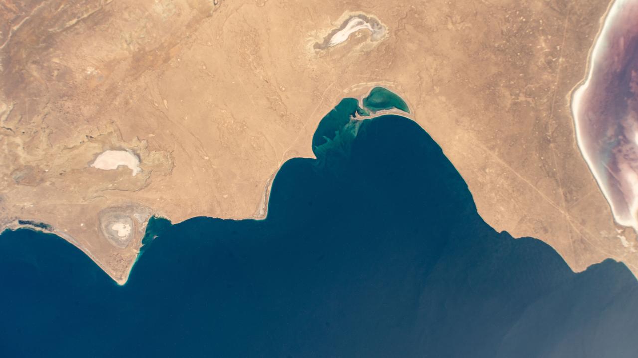 iss072e007016 (Oct. 1, 2024) --- The cold desert climate region of Kazakhstan on the coast of the Caspian Sea coast is pictured from the International Space Station as it orbited 259 miles above.