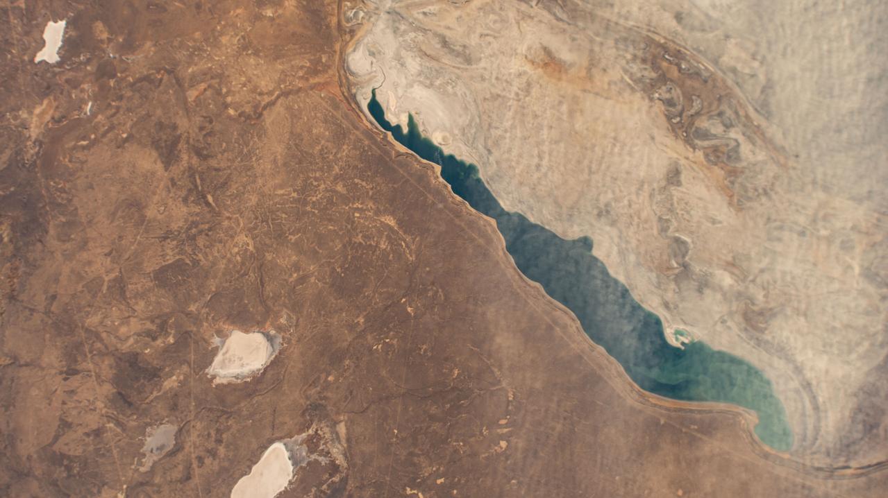 iss072e007017 (Oct. 1, 2024) --- The Aral Sea, once the third largest lake in the world that began shrinking in the 1960's after rivers that replenished it were diverted for irrigation projects, is pictured from the International Space Station as it orbited 260 miles above Kazakhstan.