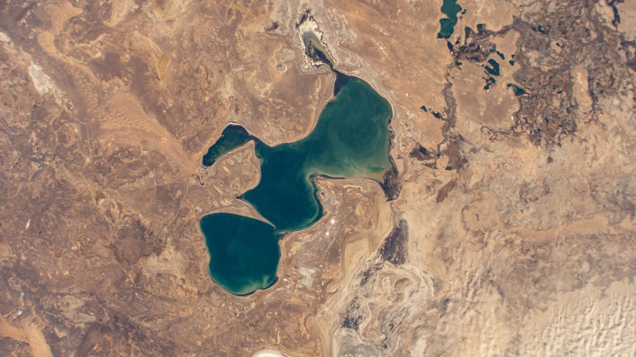 iss072e007018 (Oct. 1, 2024) --- Kazakhstan's North Aral Sea, once a part of the South Aral Sea before agricultural and irrigation activities depleted the lake, is pictured from the International Space Station as it orbited 260 miles above the Central Asian nation.