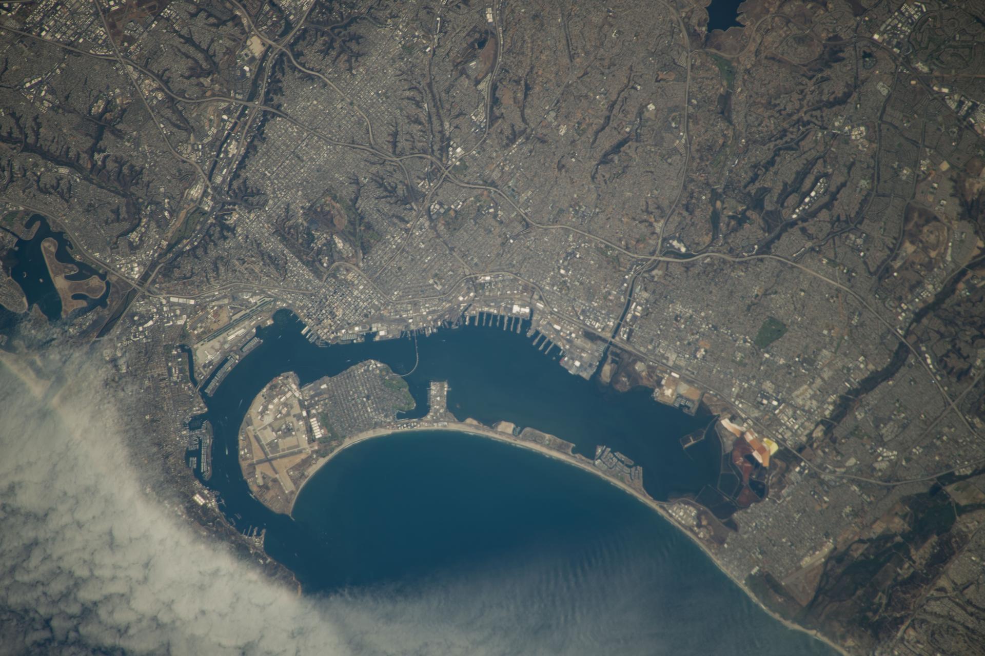 San Diego Bay, surrounded by the city of San Diego, California, and its suburbs near the U.S.-Mexico border, is pictured from the International Space Station as it orbited 257 miles above Ensenada, Baja California, on Mexico's Pacific coast.