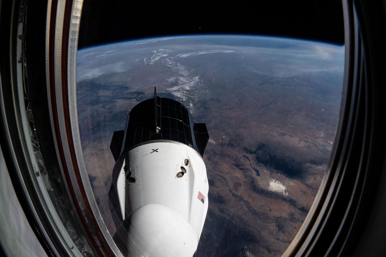 iss072e031300 (Oct. 7, 2024) -- The SpaceX Dragon Freedom spacecraft, docked to the forward-facing port of the International Space Station's Harmony module, was photographed as the orbiting lab soared 258 miles above the state of Colorado.