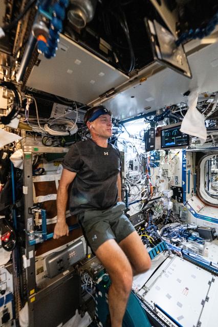 NASA image: Astronaut Nick Hague exercises on CEVIS