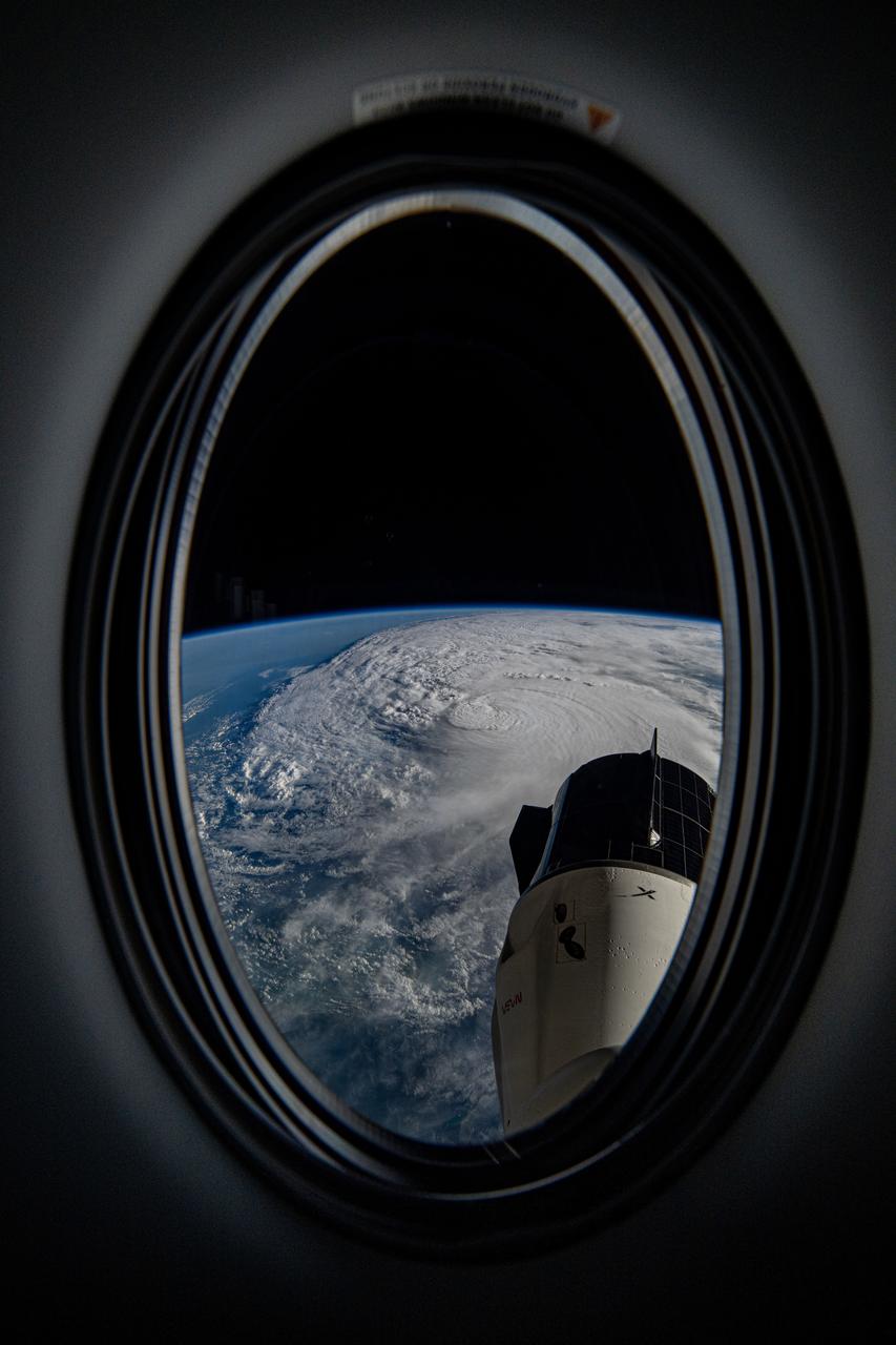 iss072e057797_alt (Oct. 9, 2024) --- Hurricane Milton is pictured as a category 4 storm in the Gulf of Mexico nearing the coast of Florida in this photograph from the International Space Station as it orbited 256 miles above. The SpaceX Dragon Freedom spacecraft is also pictured from a window on the Dragon Endeavour spacecraft. Credit: NASA/Matthew Dominick