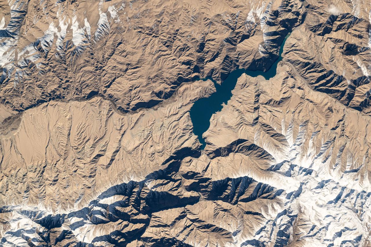 iss072e067740 (Oct. 12, 2024) --- The Tashkurgan River in western China's Hindu Kush mountains near the nations of Tajikistan and Afghanistan is pictured from the International Space Station as it orbited 259 miles above Asia.