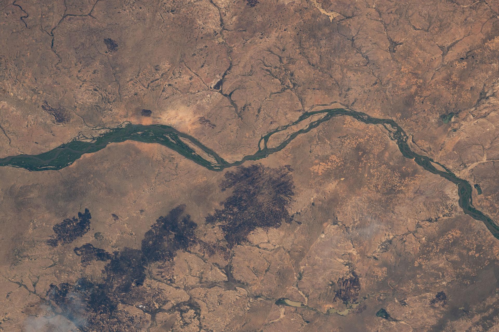 The Niger River flows through the African nation of Mali near the Sahara Desert in this photograph from the International Space Station as it orbited 257 miles above.