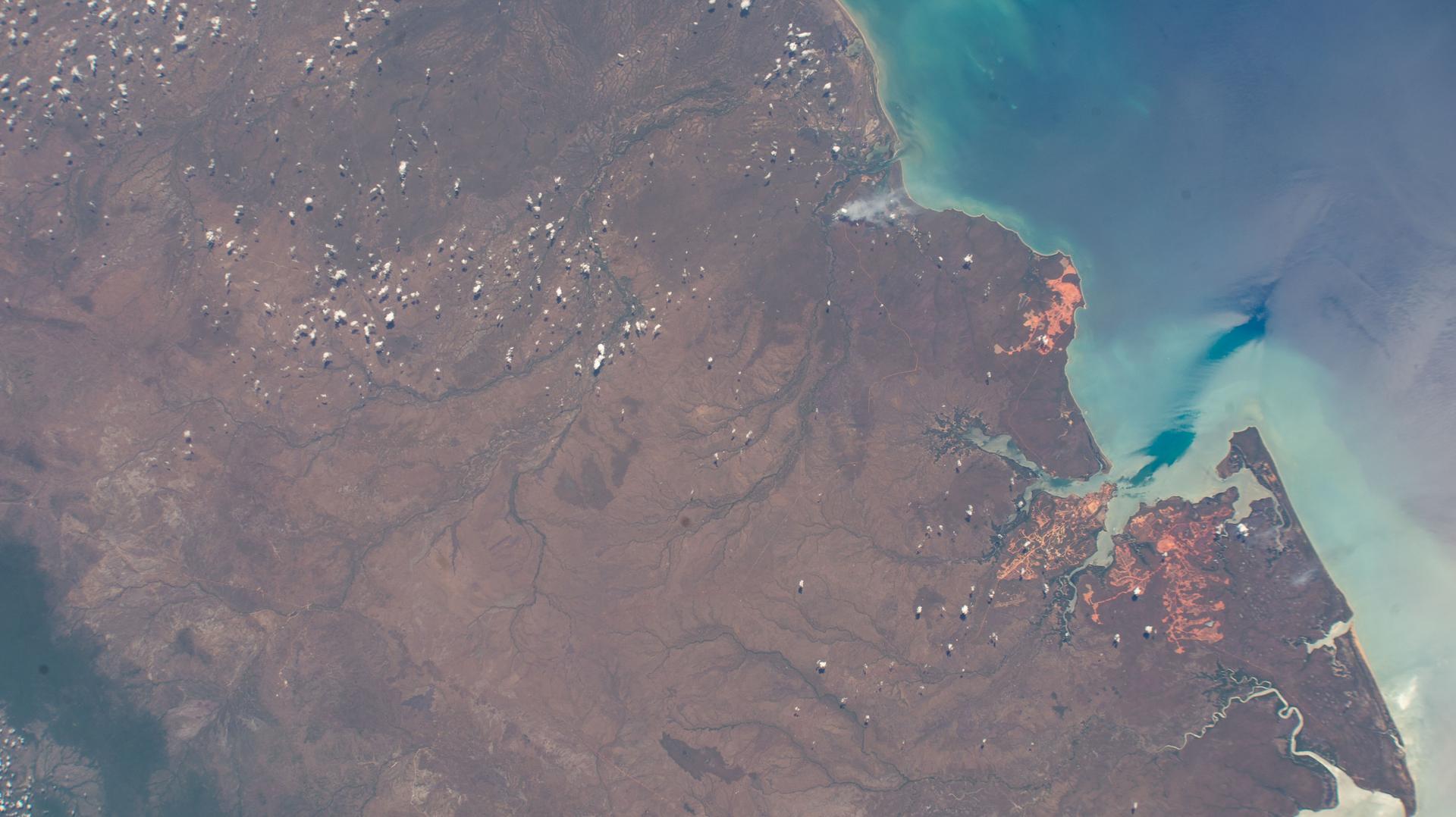 Mission River, a coastal rural locality on the Gulf of Carpenteria in the northern tip and tropical climate of Australia's state of Queensland, is pictured from the International Space Station as it orbited 261 miles above the island continent.