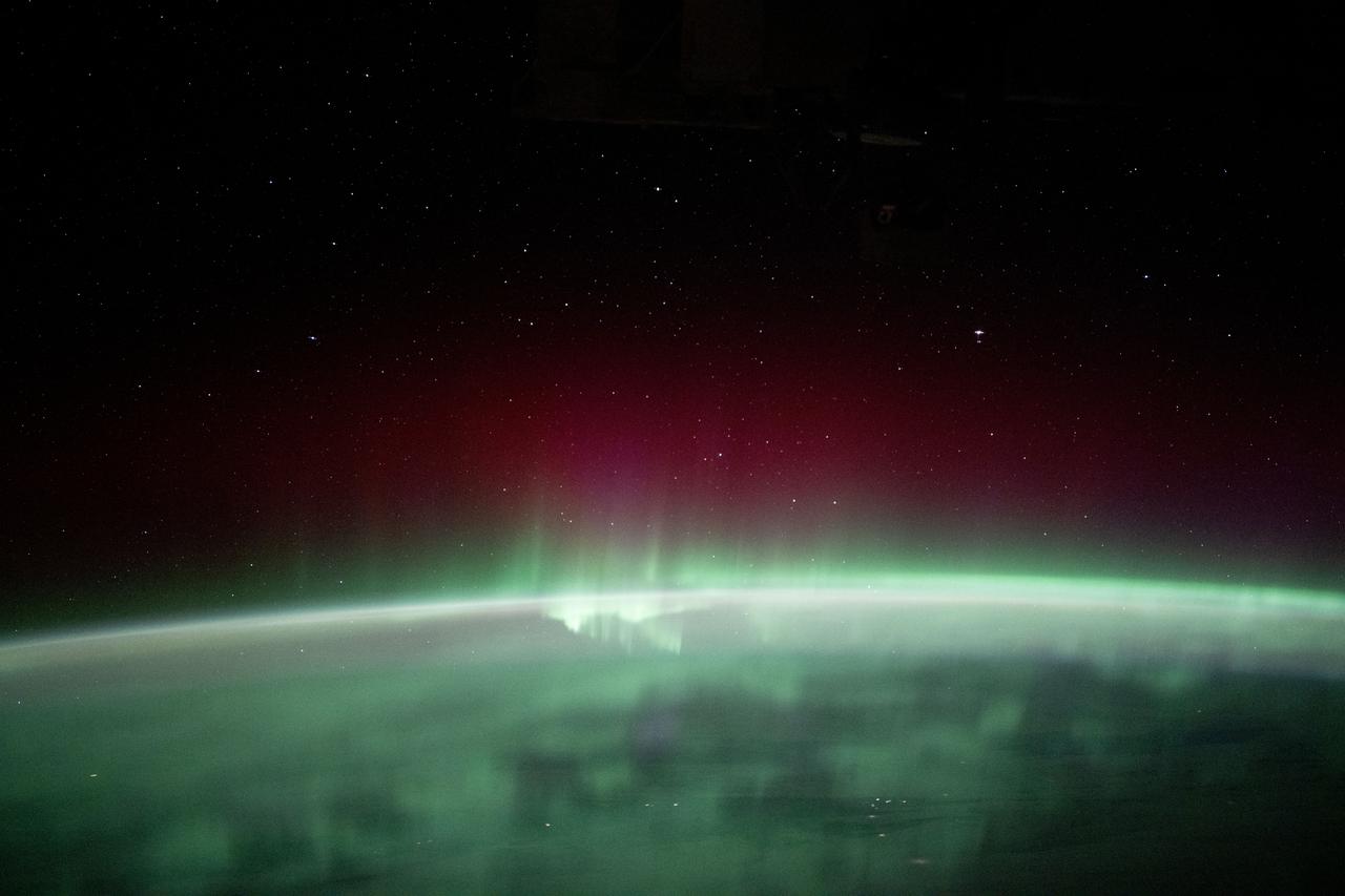 iss072e159172 (Oct. 30, 2024) --- The aurora borealis blankets the Earth in this photograph from the International Space Station as it soared 257 miles above Canada's province of Manitoba.