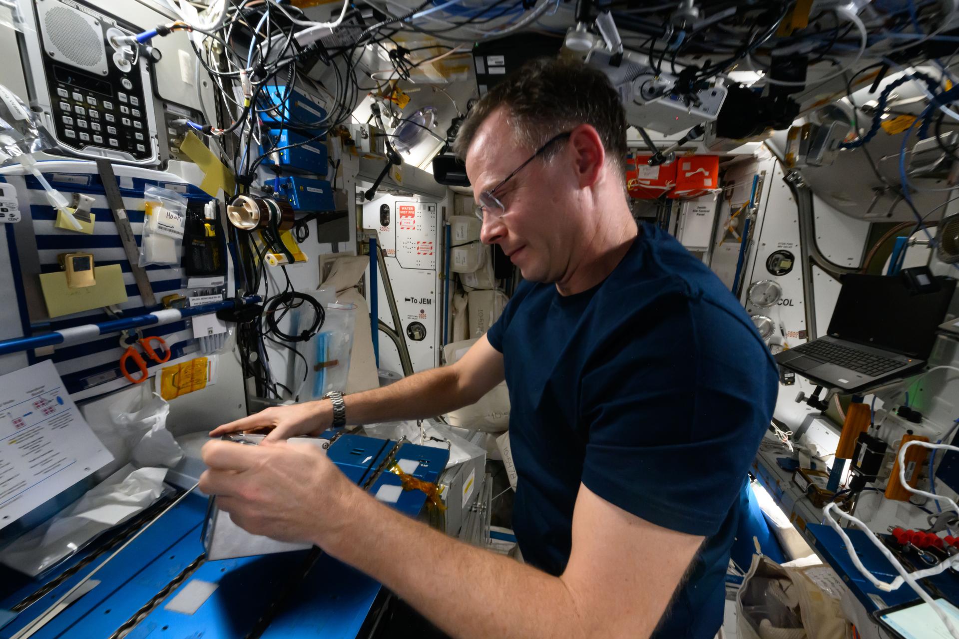 NASA astronaut and Expedition 72 Flight Engineer Nick Hague services samples of the Arthrospira C micro-algae for incubation and analysis. Scientists will expose the radiation-resistant samples to different light intensities while monitoring their cell growth and oxygen production. Results may advance life support systems and fresh food production in space.