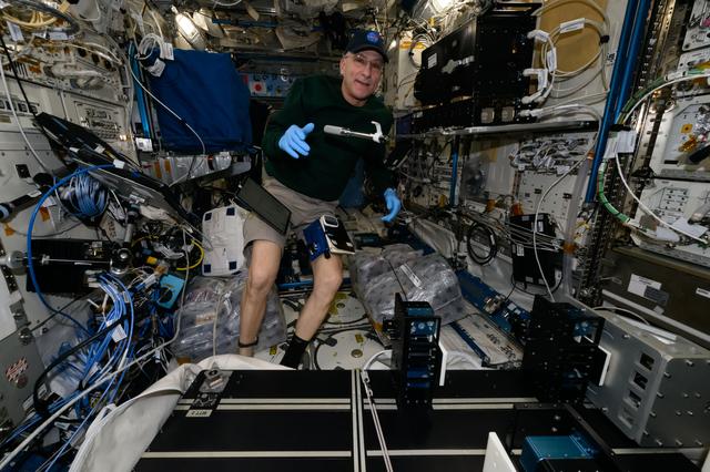 NASA image: Astronaut Don Pettit works on weekend housekeeping duties