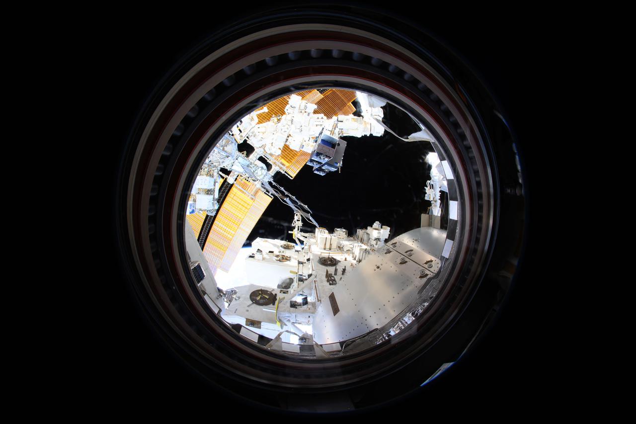 iss072e189797 (11/16/2024) --- The Canadarm2 robotic arm removes Materials ISS Experiment (MISSE) science carriers from the Kibo laboratory module's airlock. The MISSE Flight Facility mounted outside the International Space Station allows researchers to test the performance and durability of materials and devices. This is done by exposing items of interest to everything that makes the space environment harsh, including radiation, highly reactive atomic oxygen, microgravity, and extreme temperatures.