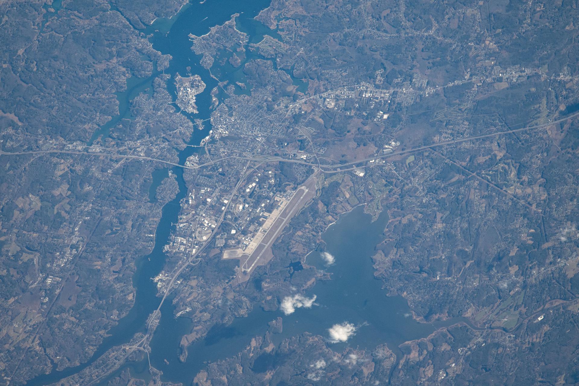 Portsmouth International Airport in New Hampshire is flanked by Great Bay and the Piscataqua River in this photograph from the International Space Station as it orbited 263 miles above.