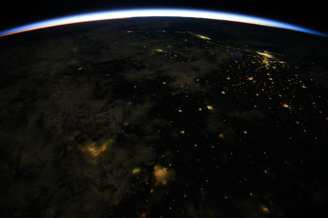 NASA image: An orbital sunrise crowns Earth's horizon